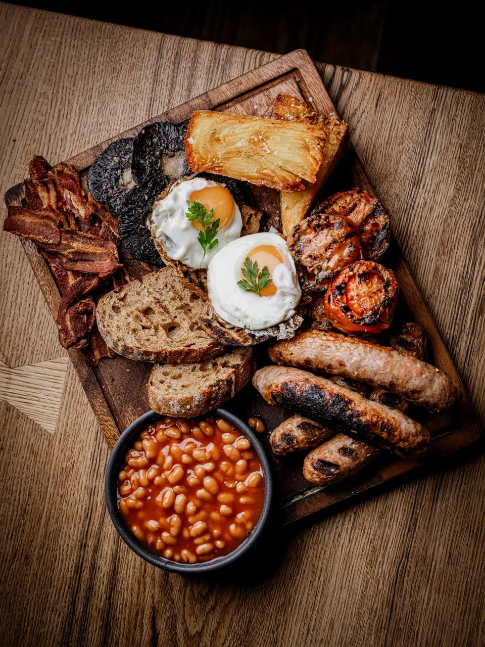 The BRIX Big Breakfast board — bacon, sausages, fried eggs, mushrooms, grilled tomatoes, hash brown and beans