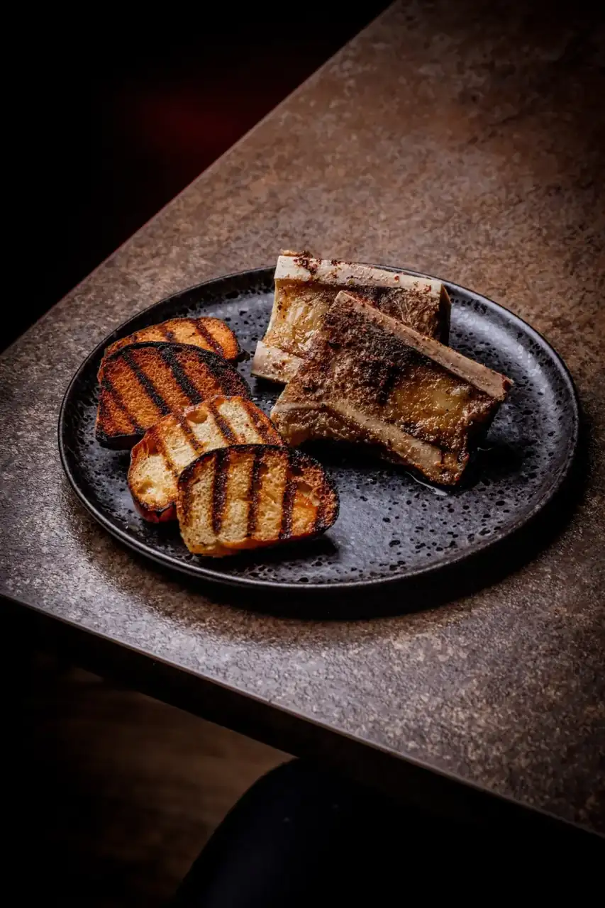 Fire-roasted bone marrow to start